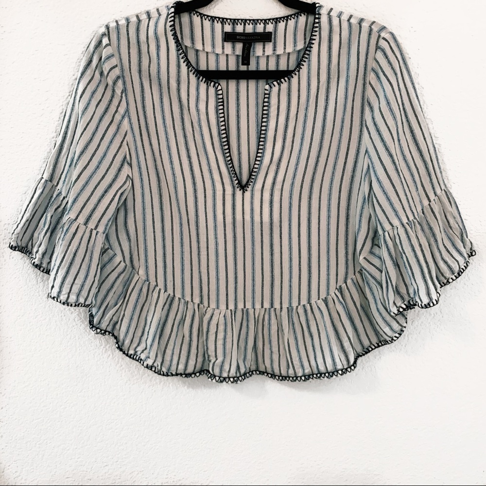 blue and white v neck peplum top